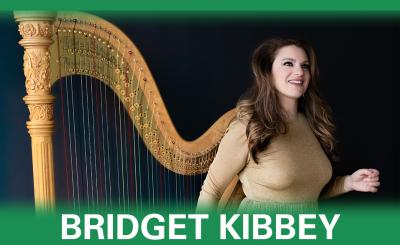 Bridget Kibbey next to harp in a black background